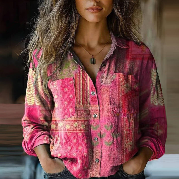 Chic women's printed blouse with a unique vintage boho pattern. Long sleeve top ideal for transitional fashion.