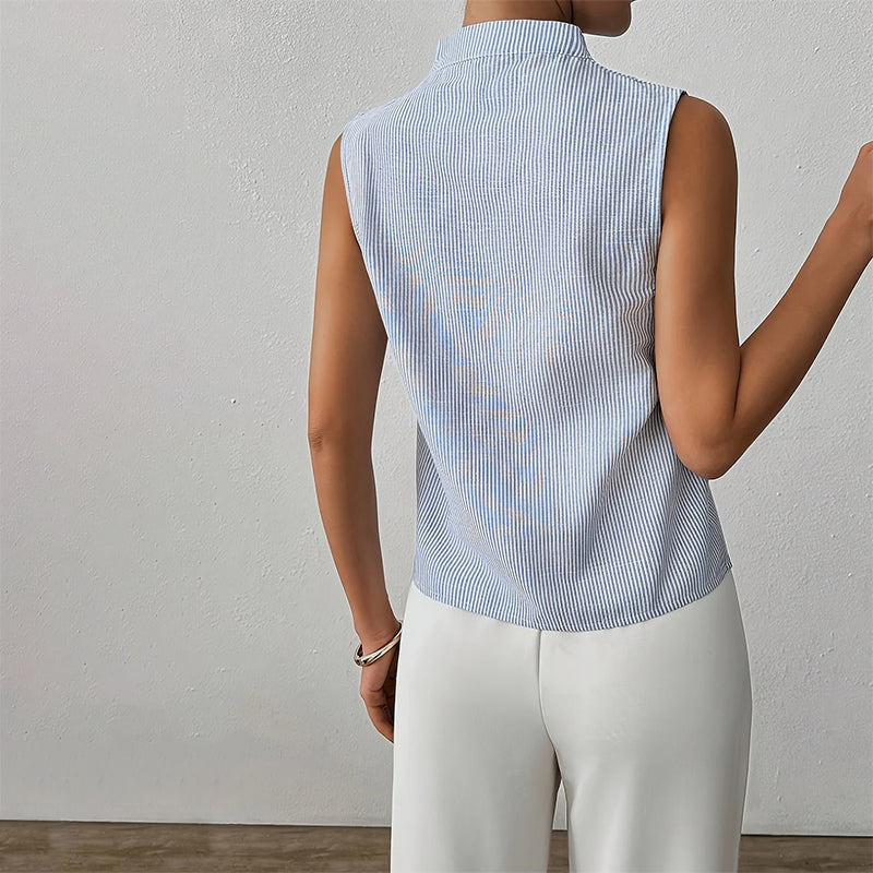 Women's striped sleeveless top, featuring a modern stand collar. A chic and versatile clothing option.