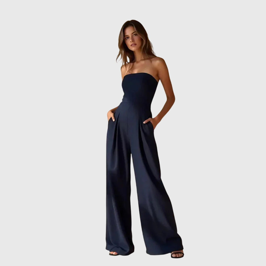 Sophisticated women's strapless wide-leg jumpsuit. Elegant formal wear with a pleated waist for stylish comfort.