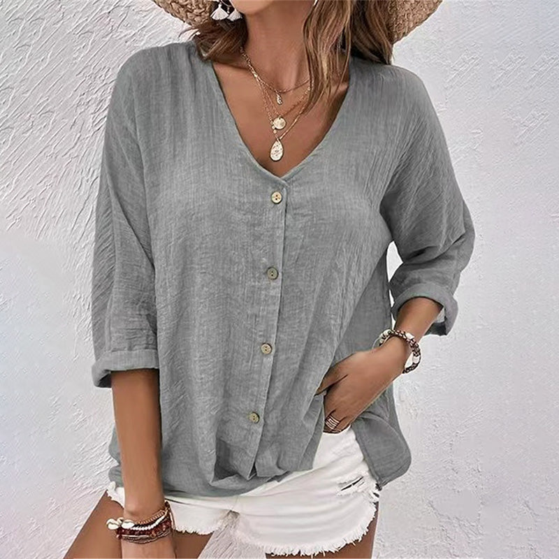 Stylish women's V-neck 3/4 sleeve blouse offering effortless style & comfort, ideal for everyday wear.