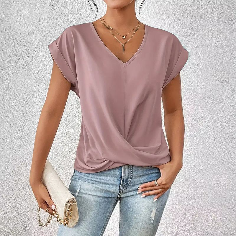 Elegant women's V-neck draped short sleeve top. Perfect for workwear or sophisticated casual summer style.
