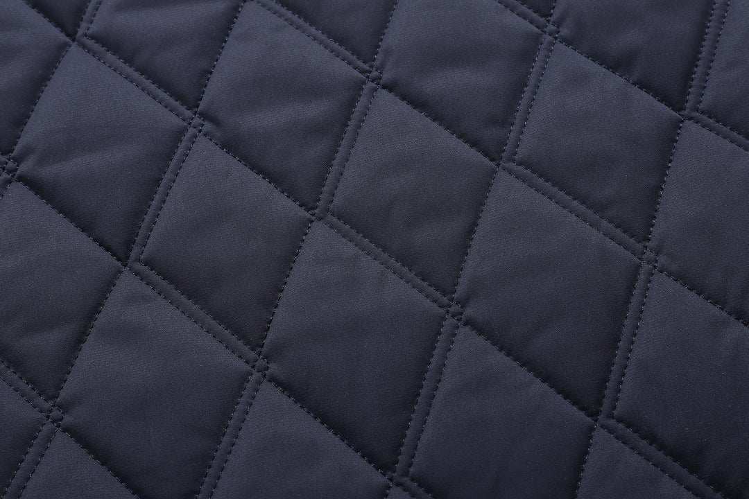 Durable men's waterproof quilted jacket, combining style and protection. Ideal fall jacket for modern men's fashion.