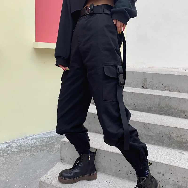 Stylish women's high waist elastic cargo pants with practical utility pockets for versatile streetwear looks.