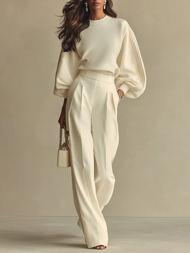 Women's chic knit two-piece set featuring a crew neck top and high-waist pants, perfect for comfortable casual wear.