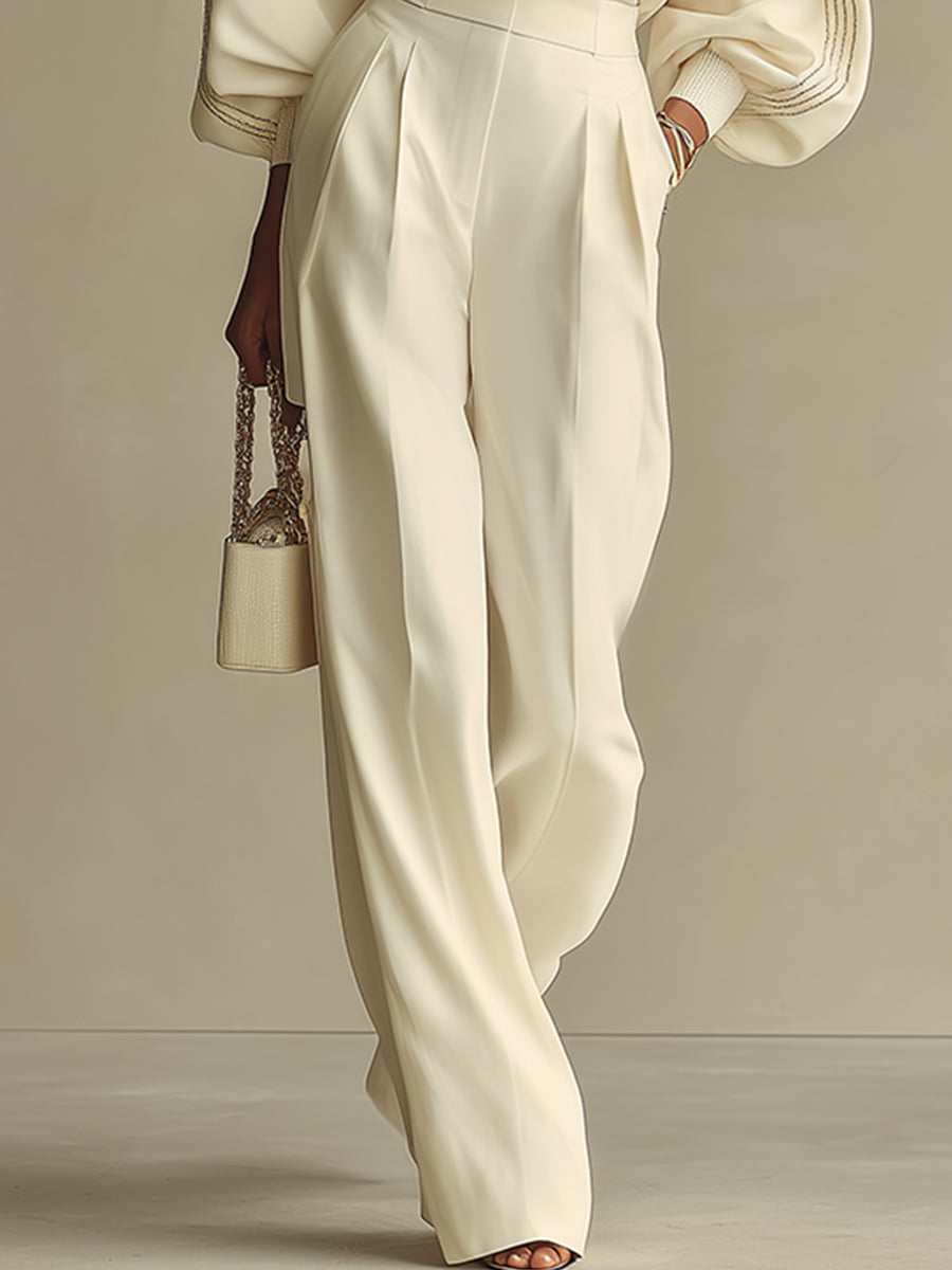 Comfortable women's knit two-piece outfit with a cozy crew neck top & flattering high-waist knit pants. Chic casual style.