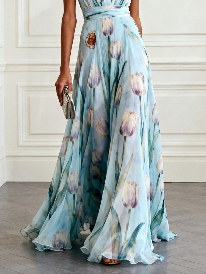 Pink women's V-neck maxi dress, elegant tulip floral print, A-line silhouette, sleeveless for summer.