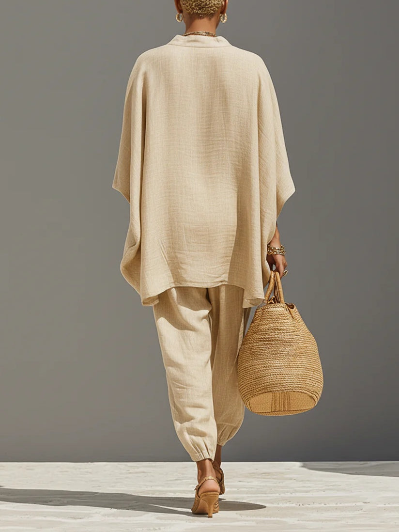 Chic women's light khaki matching set featuring an asymmetrical top & comfy joggers; ideal casual outfit.