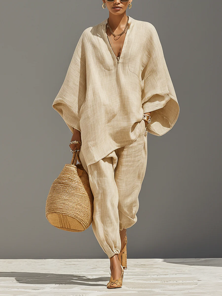 Women's light khaki asymmetrical top & jogger two-piece set for chic, comfortable loungewear.