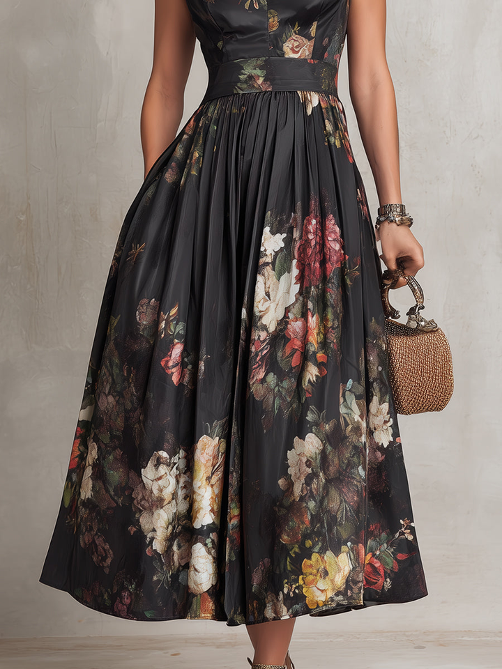 A-line black floral pleated midi dress for women, with a chic keyhole collar, offering a flattering silhouette.