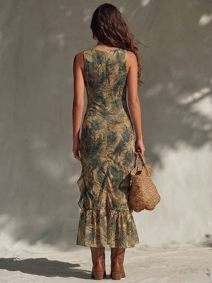 Elegant green floral print women's maxi dress with a flattering side slit, a beautiful flowy summer outfit.