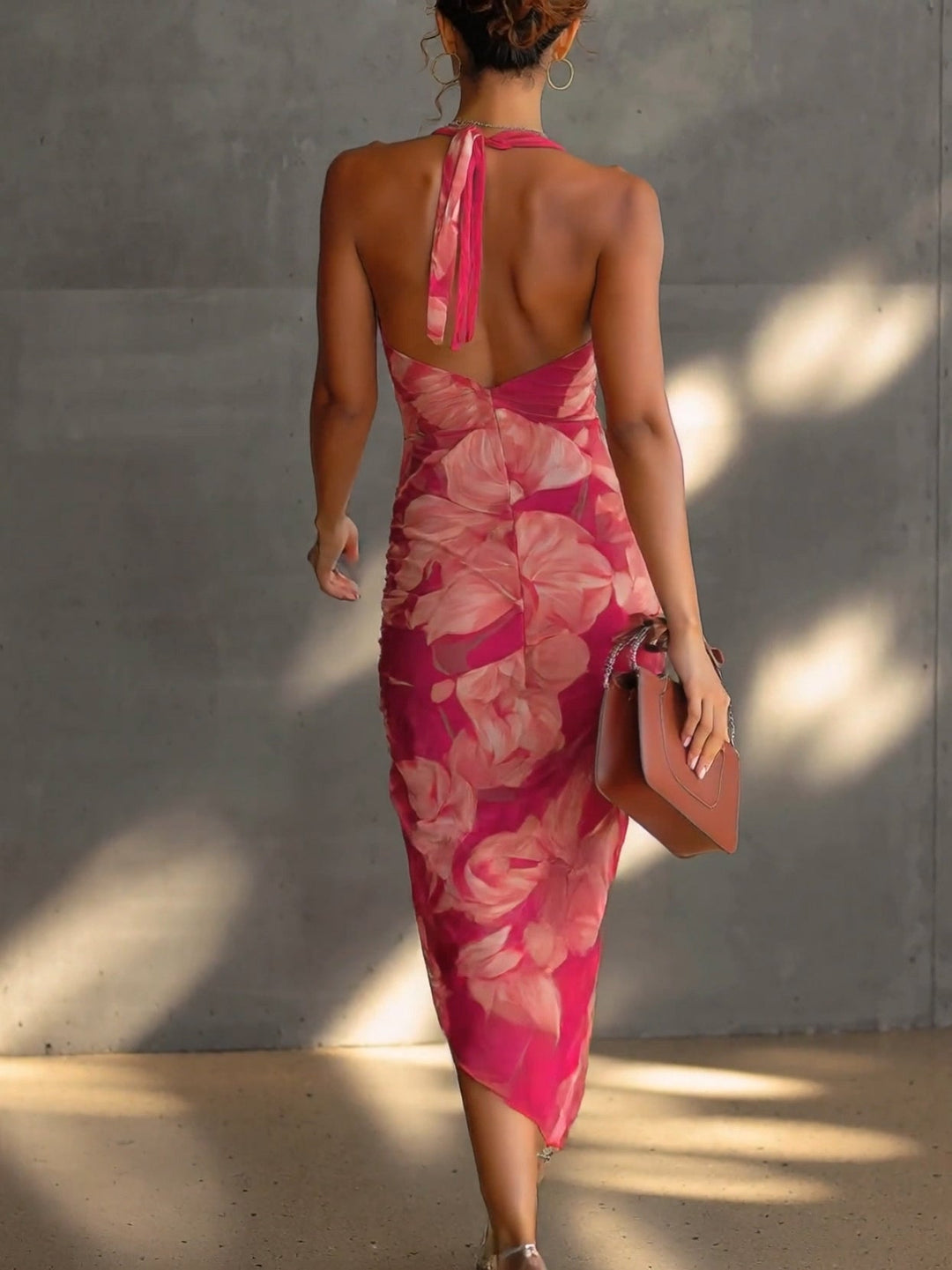Elegant women's fuchsia floral bodycon party dress with a vibrant print. Ideal for summer & cocktail events.