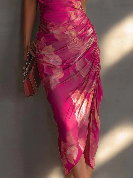Women's dazzling fuchsia floral bodycon dress, vibrant & curve-hugging. A stylish choice for any elegant event.