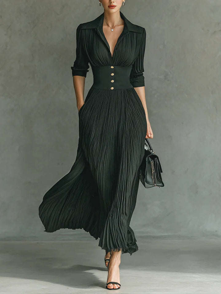 Women's tailored waist maxi dress in a flowing fabric, perfect for elegant casual or evening wear. Flattering fit.