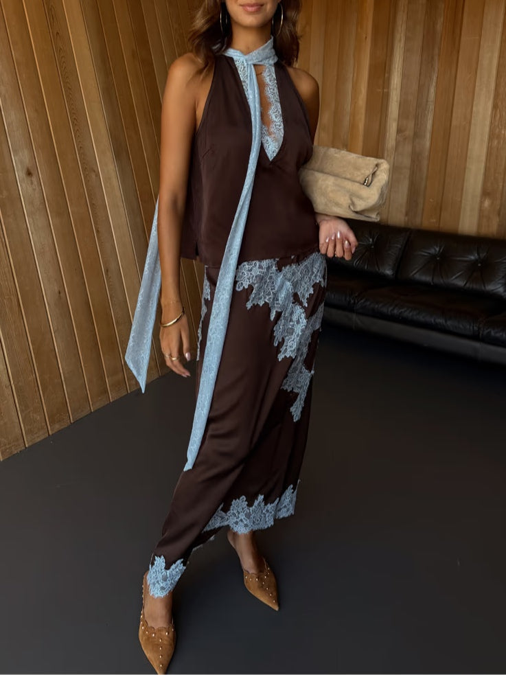 Summer-ready women's brown halter & maxi skirt two-piece set, perfect for elegant outdoor events.