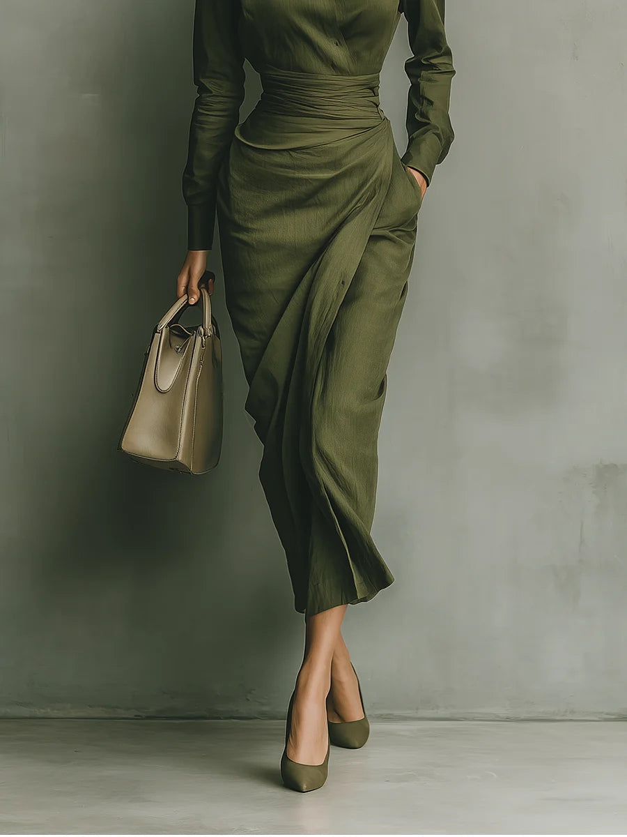 Women's elegant green maxi dress, featuring a collar and flattering fitted drape. Perfect for formal occasion wear.