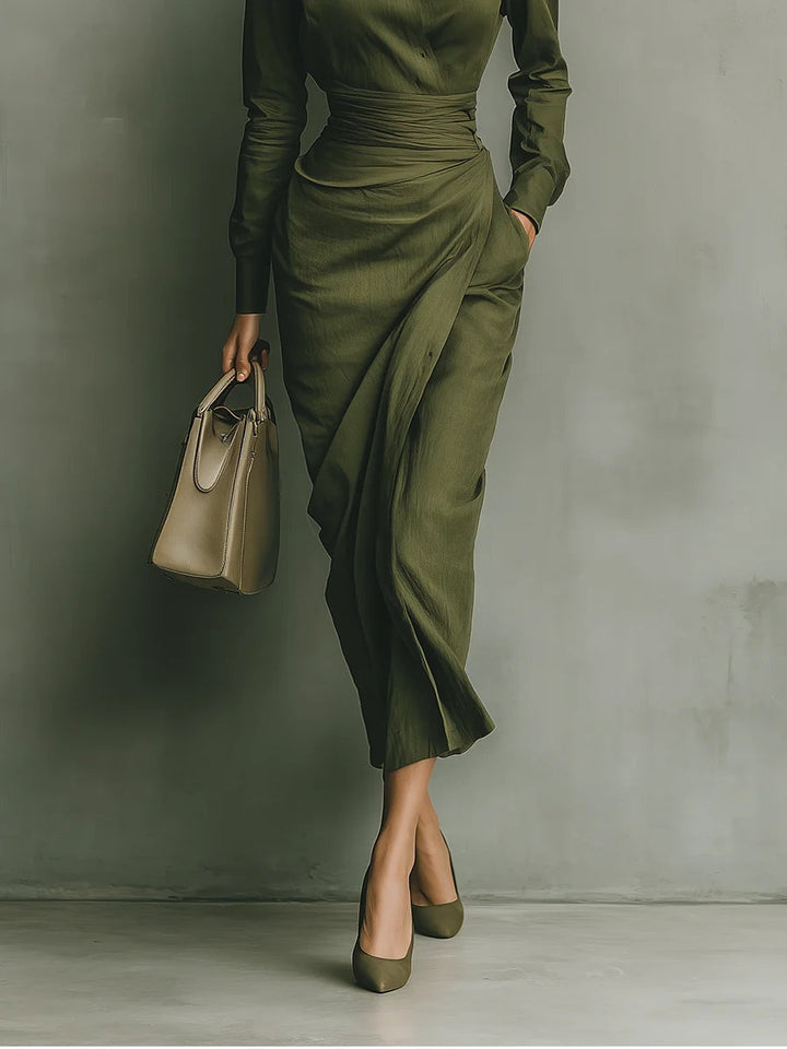 Women's elegant green maxi dress, featuring a collar and flattering fitted drape. Perfect for formal occasion wear.