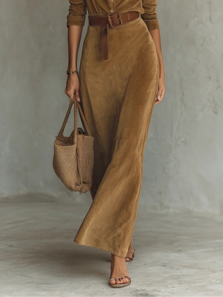 Flattering women's midi dress with a belt, long sleeves, and button front for elegant casual wear.