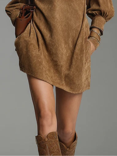 Stylish women's turtleneck mini dress in cozy fabric. Versatile long sleeve dress for autumn & winter fashion.