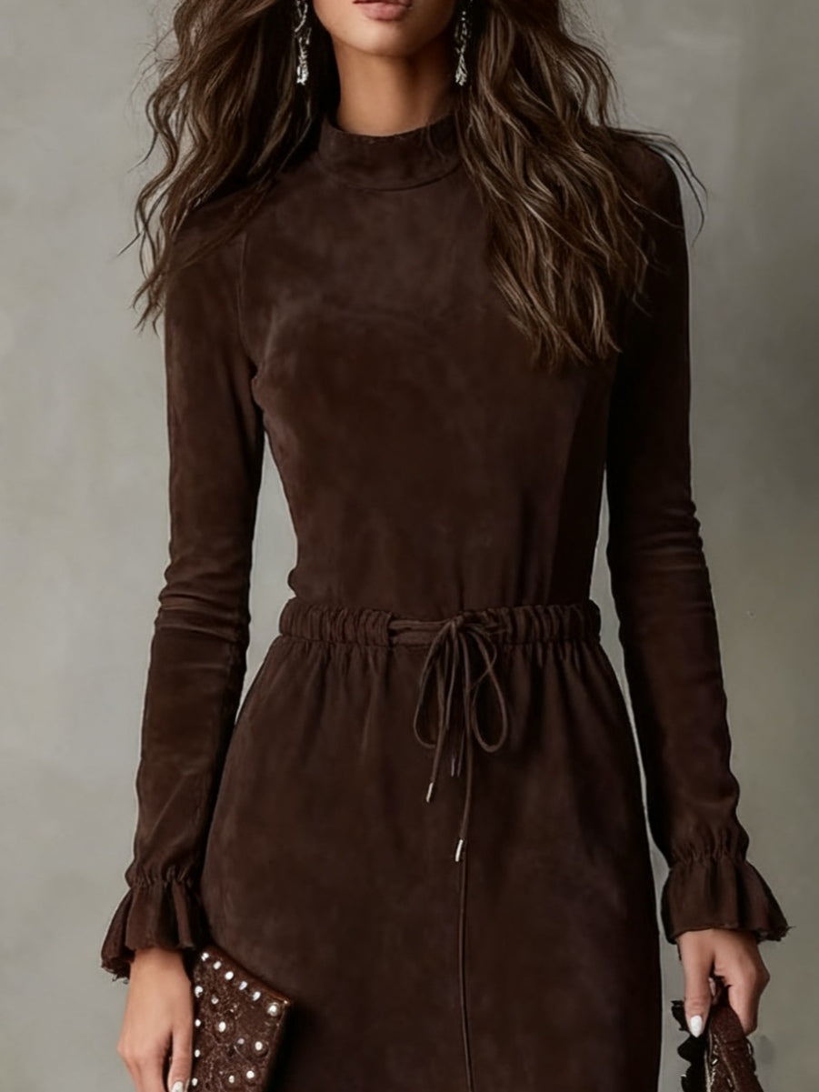 Sophisticated women's long-sleeve midi dress featuring a flattering tie-waist. Comfortable for elegant casual style.
