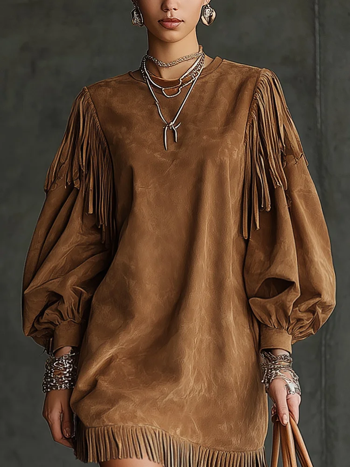 Chic women's western-style mini dress featuring trendy puff sleeves, elegant design, and playful fringe details.