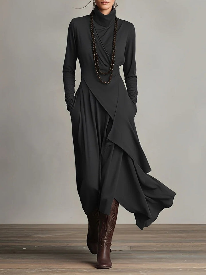 Sophisticated navy blue high neck maxi dress for women, flowing and versatile, perfect for day or evening elegance.