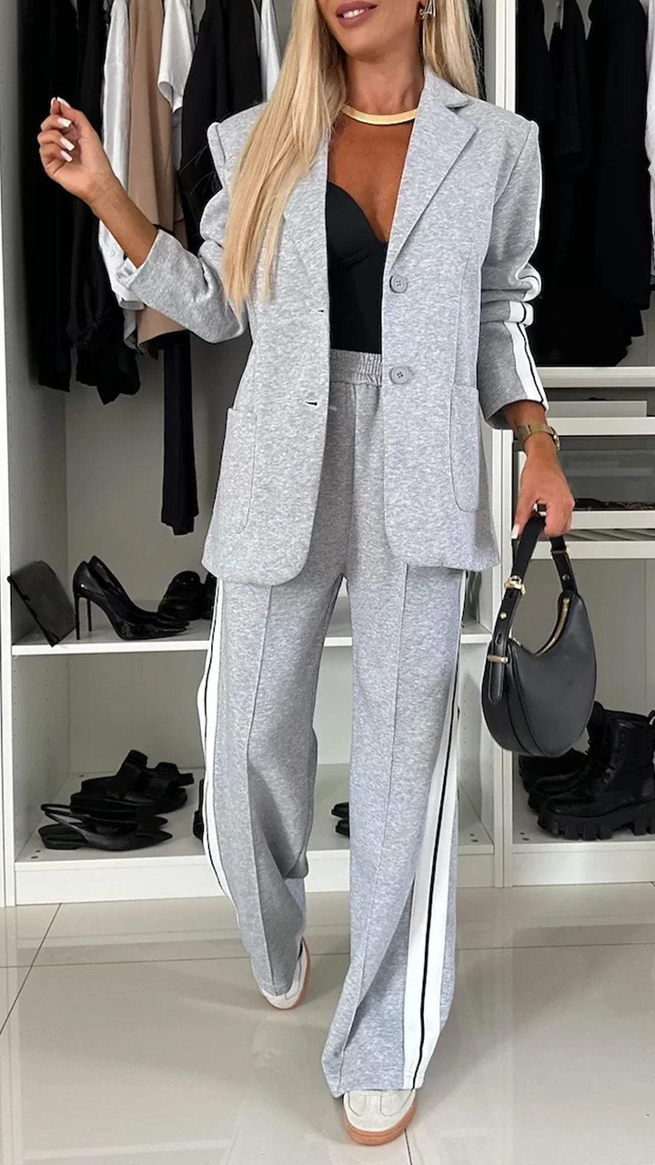 Women's elegant long sleeve casual suit set in a soft cotton blend, ideal for autumn wear.