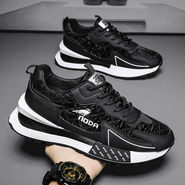Gray men's chunky platform sneakers with lace-up design for comfortable, trendy casual wear.