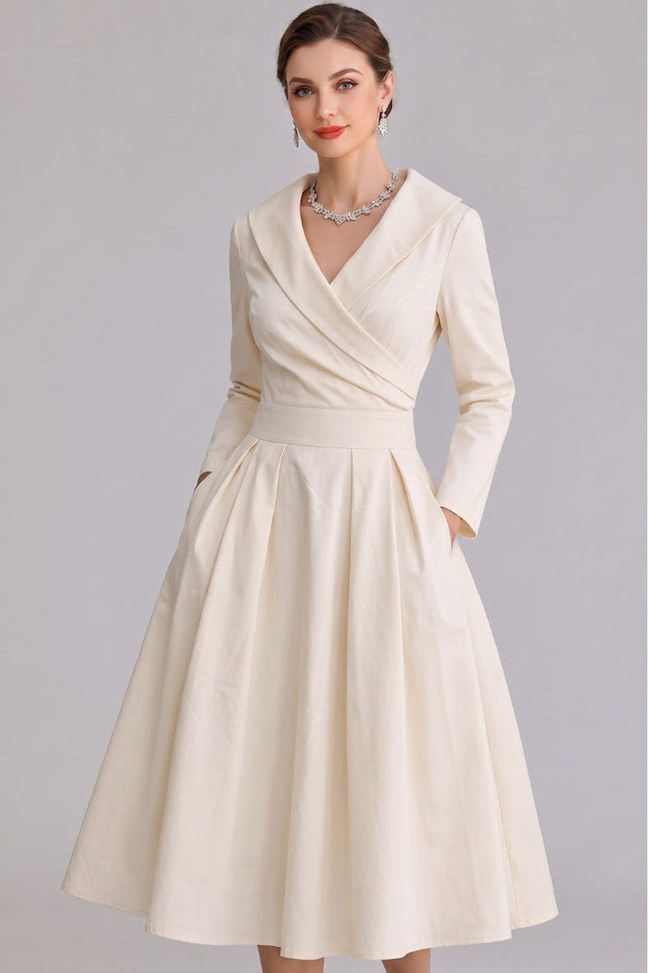 Elegant women's midi dress with practical pockets, perfect for versatile occasion wear.