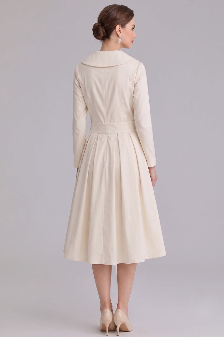 Chic beige midi dress, a versatile women's fashion staple for elegant everyday or special occasions.