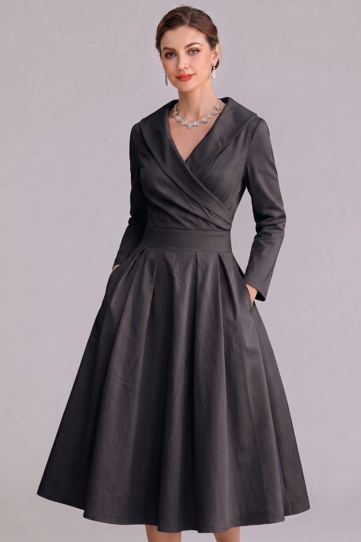 Navy women's midi dress with pockets, offering versatile casual chic style and classic design.