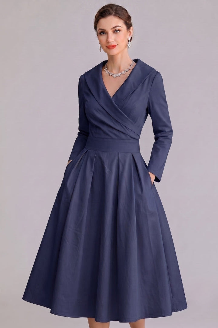 Classic women's midi dress with pockets, elegant design for versatile occasion and party wear.