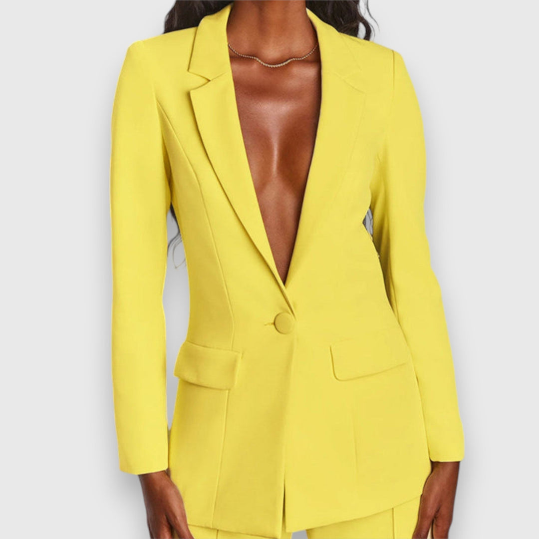 Sophisticated women's two-piece blazer & trousers set. Chic formal & elegant office wear.