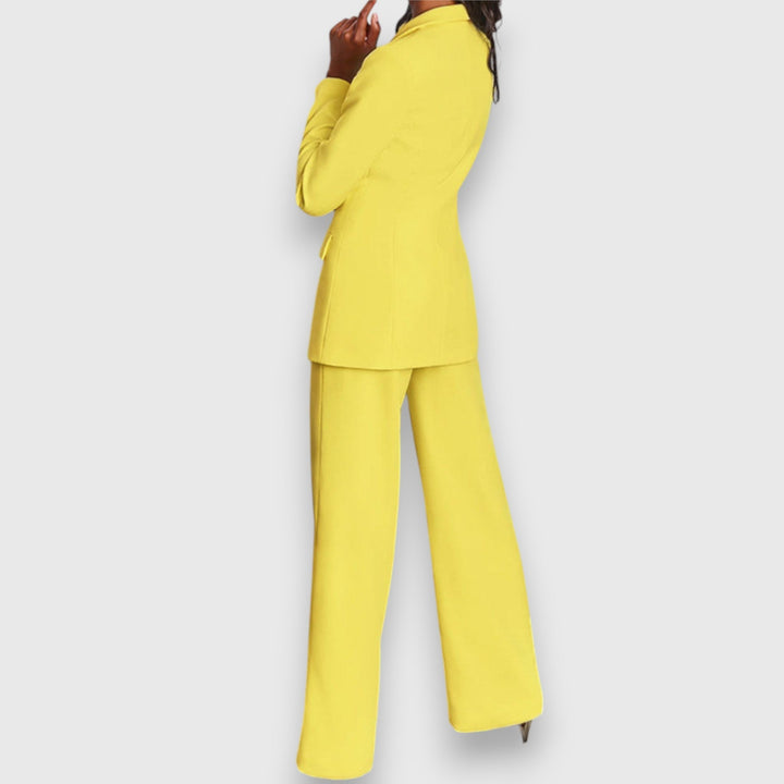 Fashionable women's two-piece blazer & trousers set. Smart casual to formal office outfit.