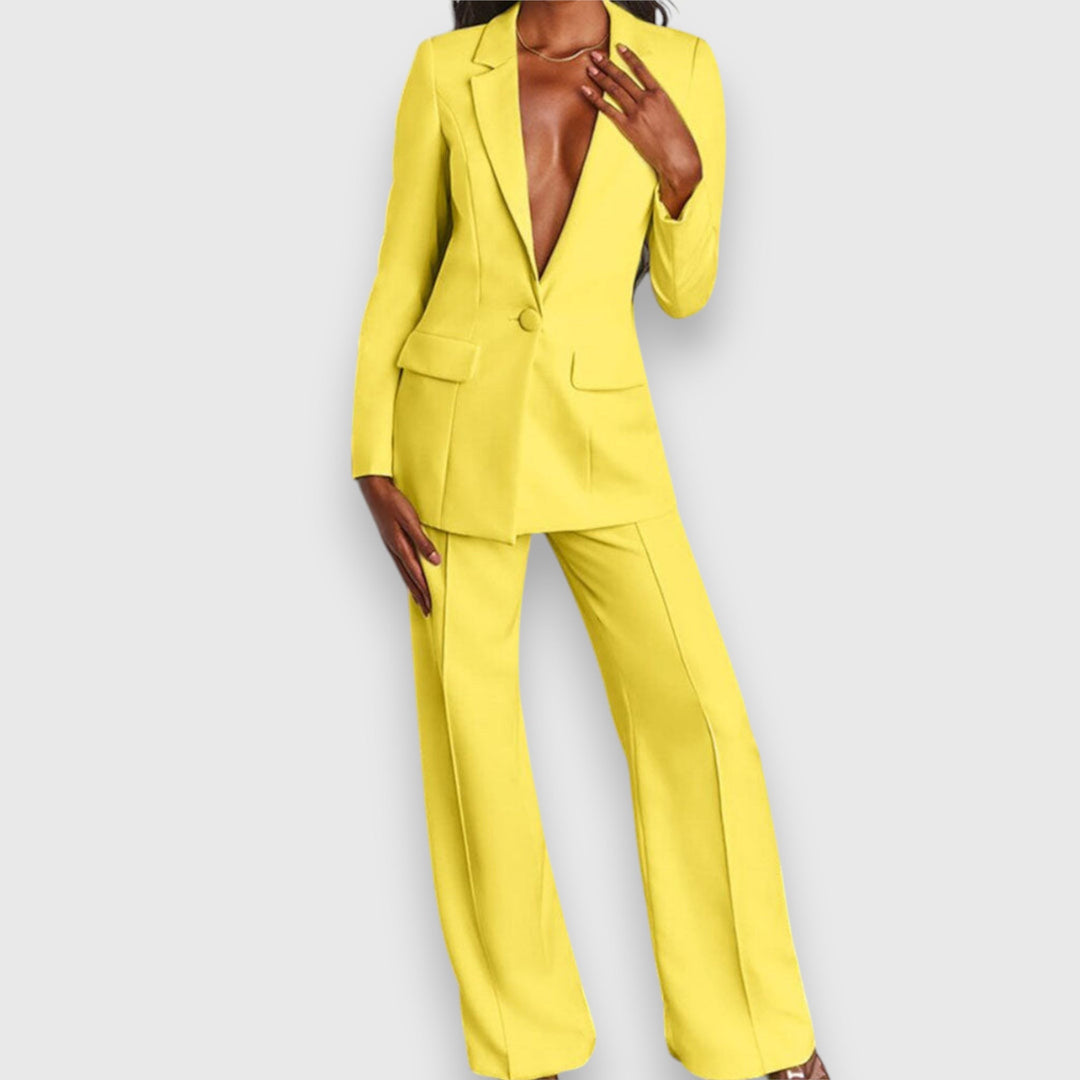 Luxury women's two-piece blazer & trousers set. Elegant formal fashion for special events.