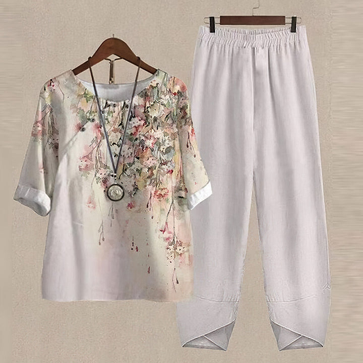 Chic women's two-piece shirt & trouser set. Perfect for spring & summer casual wear.