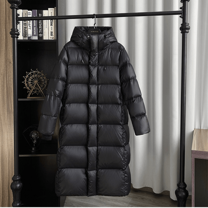 Warm hooded quilted jacket for women, perfect elegant winter outerwear.