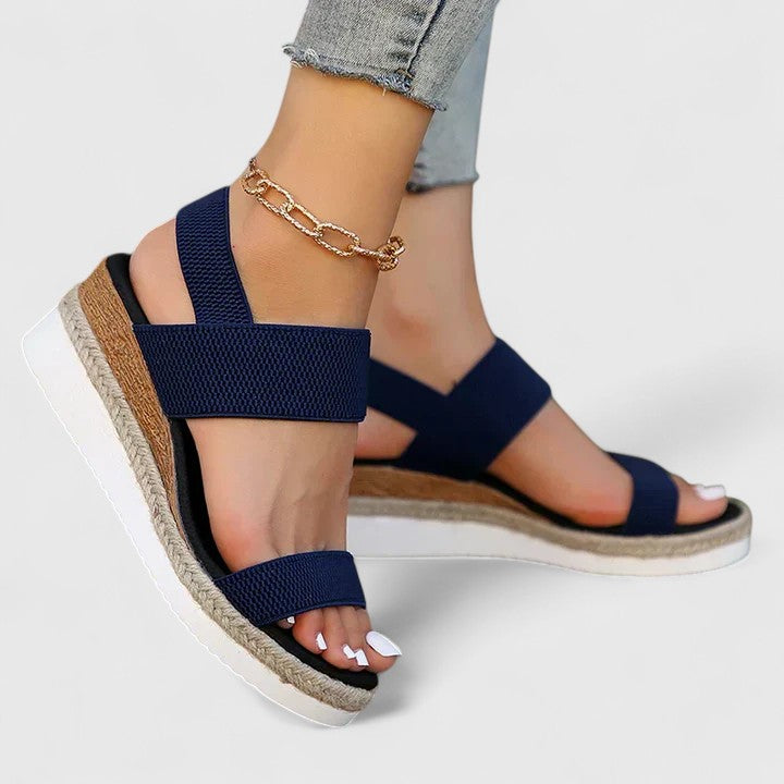 Casual women's walking sandals, orthopaedic arch support, wedge heel, elastic for comfort.