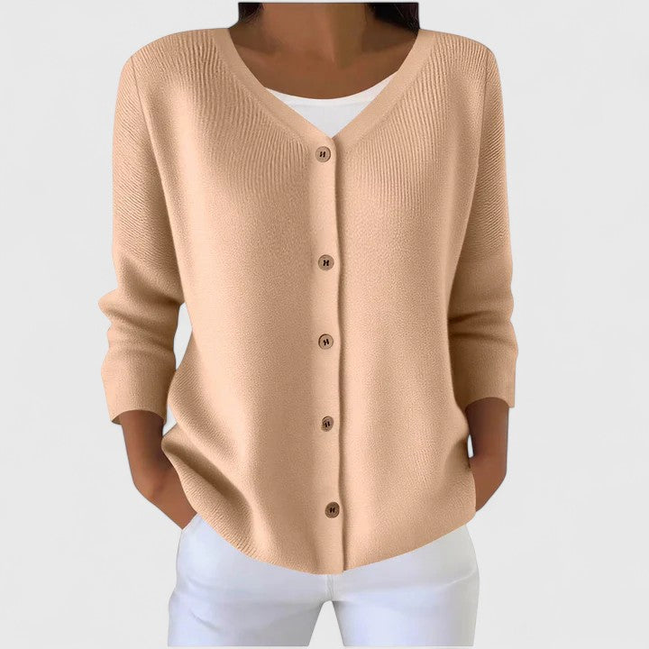 Stylish button-down hooded cardigan for women, an elegant and versatile layering piece.