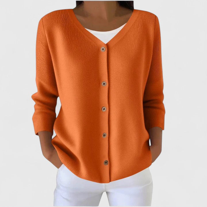 Textured knit fabric of a women's elegant hooded cardigan, comfortable and versatile.