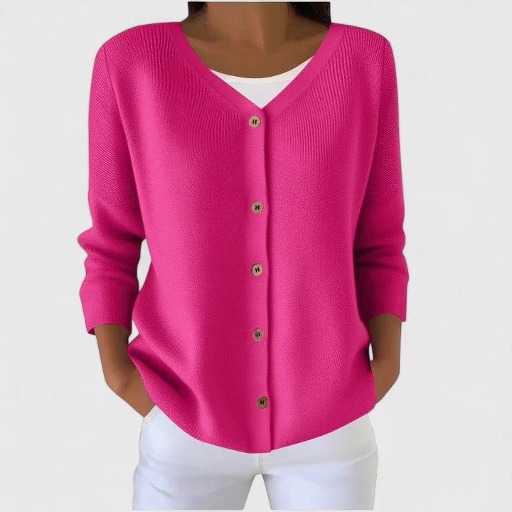 Women's hooded button-down cardigan. Elegant, versatile knitwear for fall/spring layering.