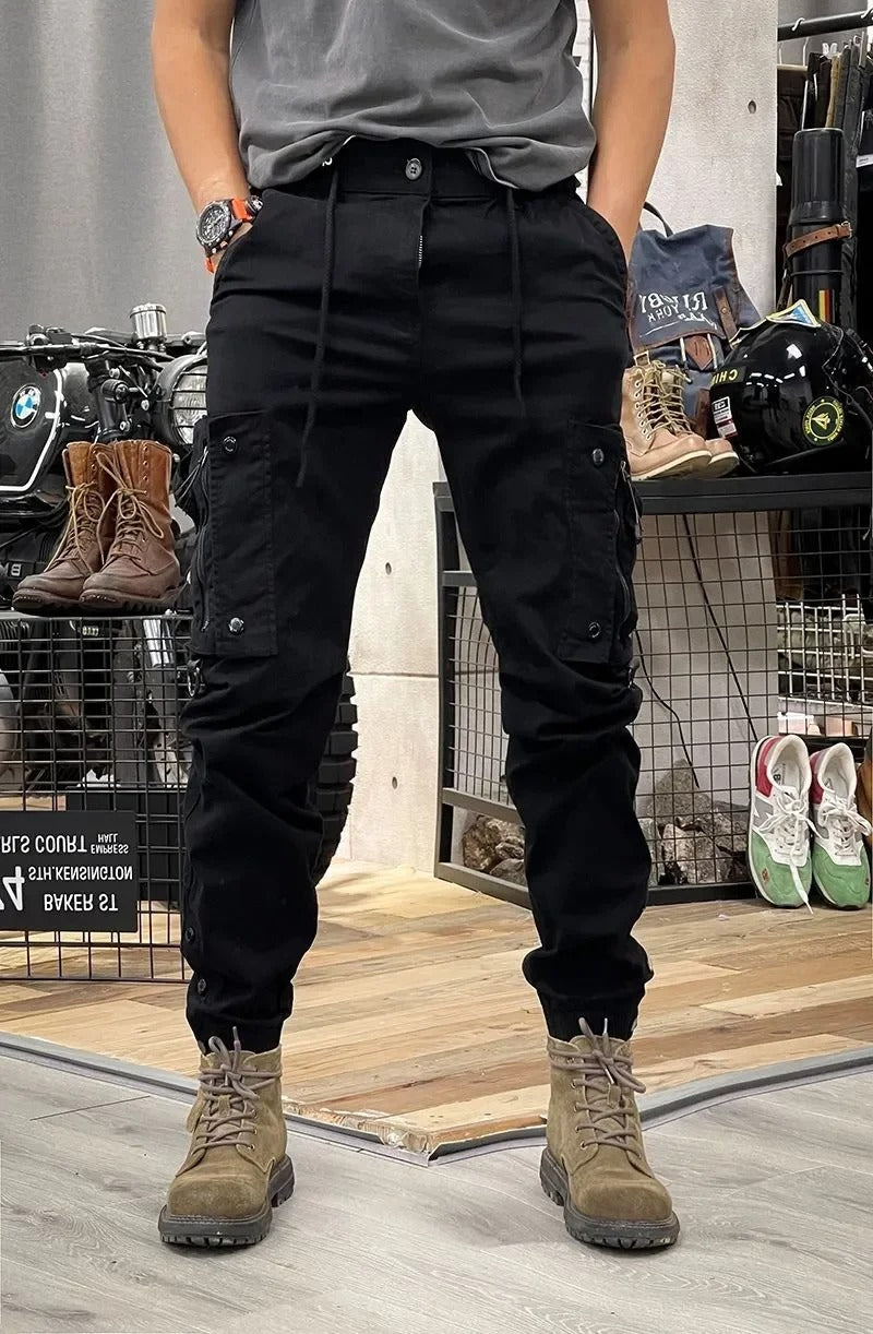 Black women's utility cargo pants, sleek and practical stretch trousers for daily wear.