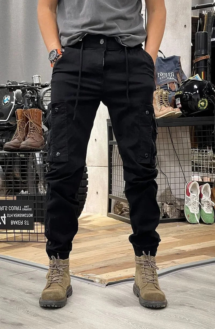 Black women's utility cargo pants, sleek and practical stretch trousers for daily wear.