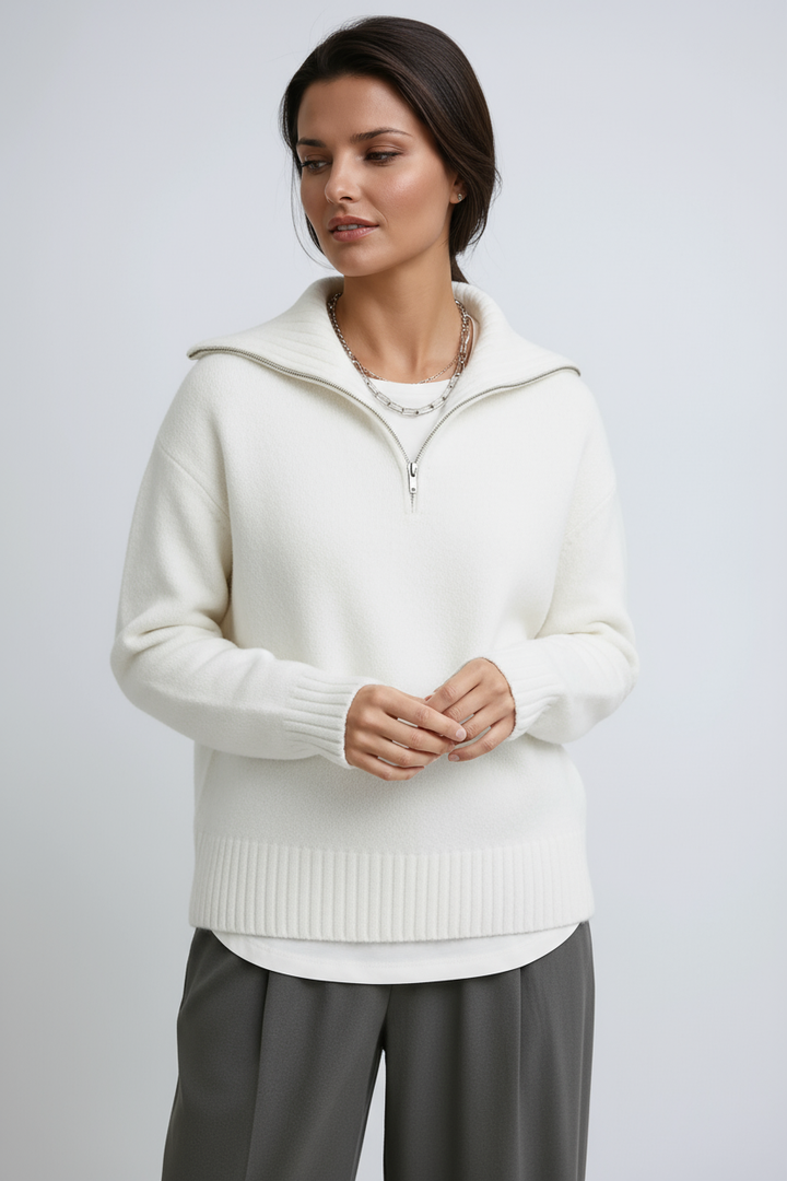 Elegant women's turtleneck sweater, zip-up knitwear in soft grey or white. Perfect for cozy winter fashion.