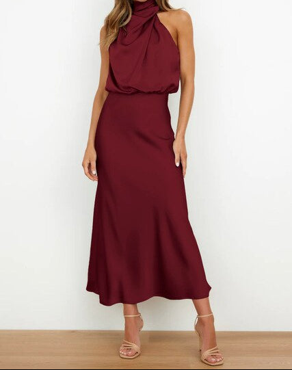 Women's elegant halter neck special occasion dress, a chic long summer gown for formal events.