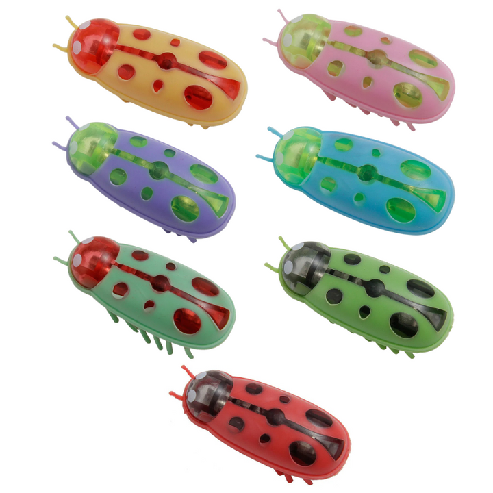 Vibrating ladybug insect cat toy stimulating a cat's natural hunting instinct. Interactive feline exercise.