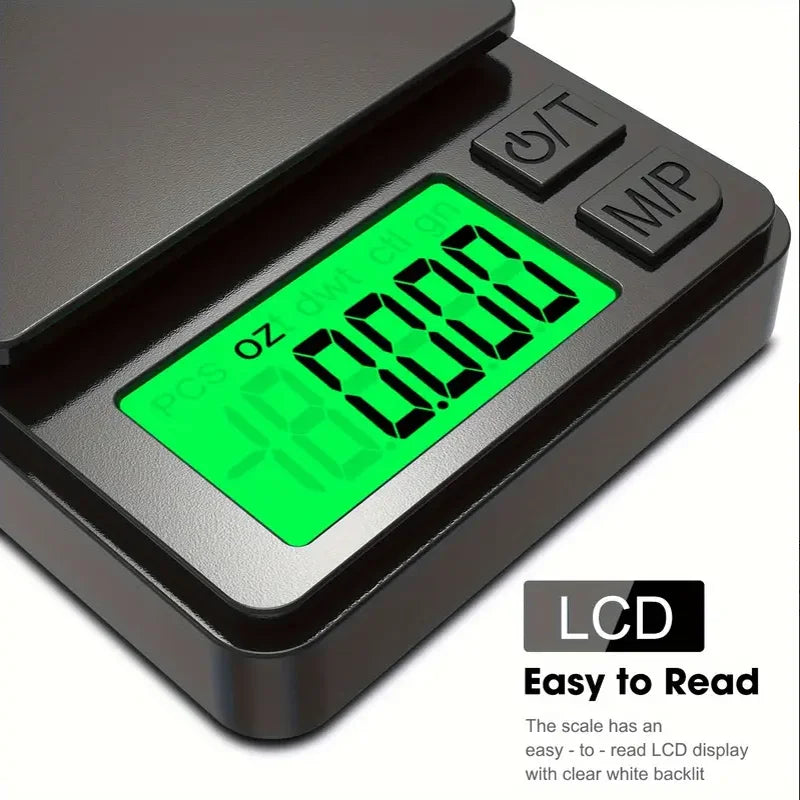 Hand holding a small, silver digital precision scale, emphasizing its portability and compact size.