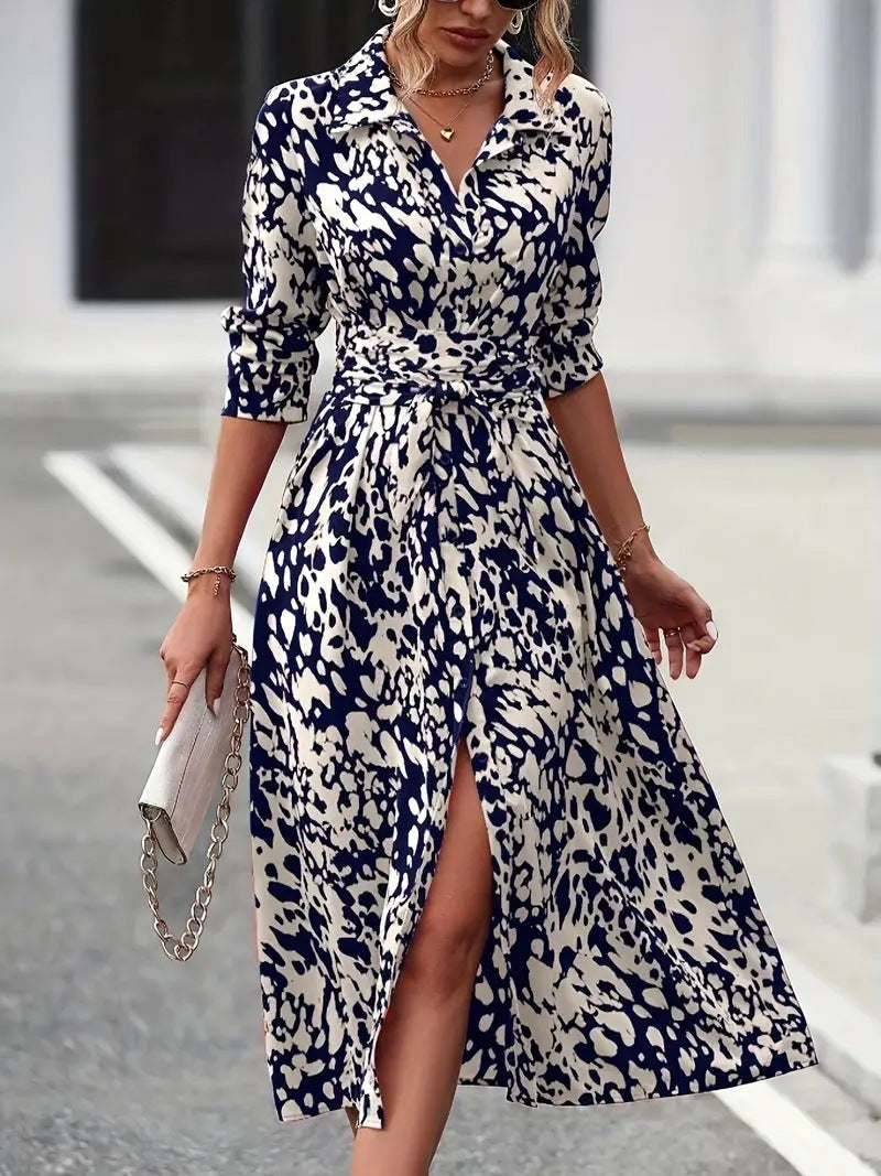 "A-Line Midi Dress with waist tie, button-down front, and classic fit, perfect for elegant and comfortable styling."