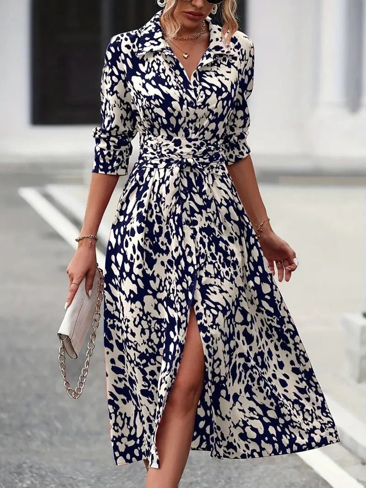 "A-Line Midi Dress with waist tie, button-down front, and classic fit, perfect for elegant and comfortable styling."