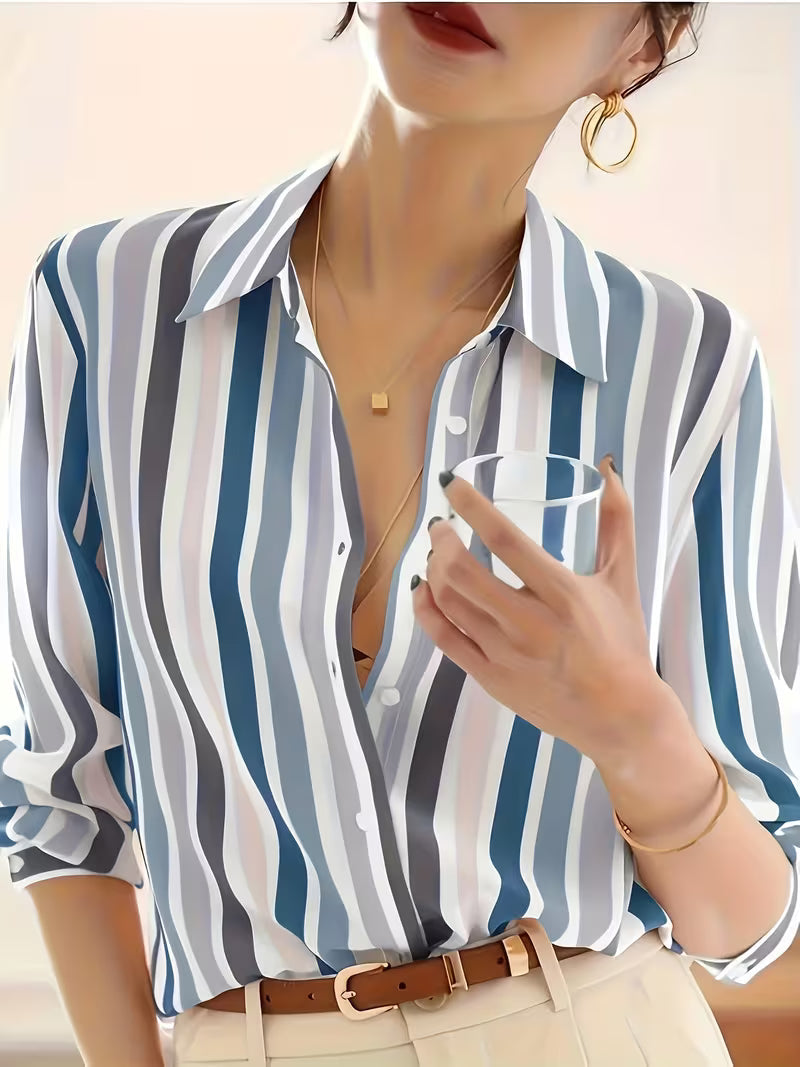 Versatile women's striped long-sleeve button-up shirt. Elegant blouse for office, casual outings, or sophisticated daily wear.
