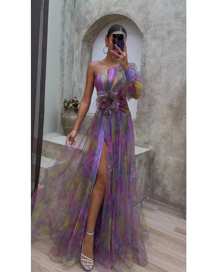 Stylish women's one-sleeve maxi dress with V-neck. Ideal elegant evening gown for wedding guests.